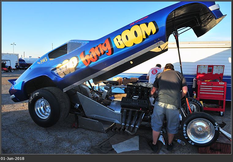 pop bang boom injected nitro funny car in the pits at funny car chaos amarillo