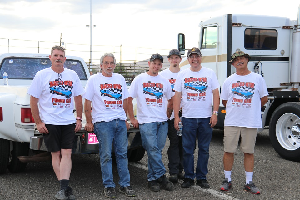 crew of pop bang boom injected nitro funny car